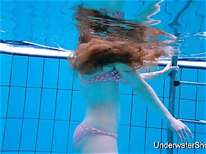 gorgeous chick displays wondrous assets underwater