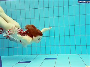 hot grind ginger-haired swimming in the pool