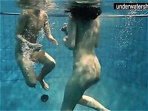 two handsome amateurs demonstrating their bods off under water